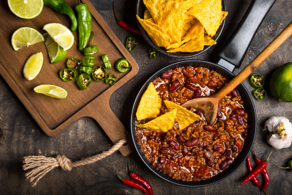 6 Easy Stovetop Chili Recipes | If you want to know how to make the best homemade chili, but you also need it to be easy to make and healthy, this post is for you. We're sharing it all -- kitchen essentials to invest in, our tried and tested chili making tips and hacks, and we've also curated 6 recipes that are quick both on prep and cook time. These are best made on a stovetop using a dutch oven, making them a one pot meal that will keep you full and satisfied without a lot of clean up!