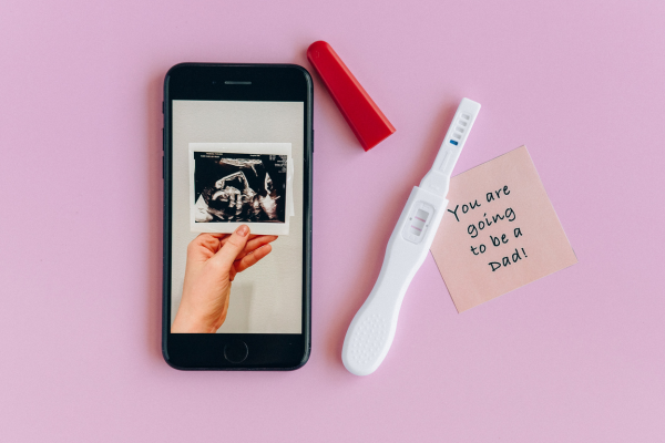 18 Pregnancy Announcement Ideas for Your Partner | Whether you're pregnant with your first or second baby (or third or fourth!), announcing the news to your husband or wife is incredibly exciting. There are so many unique and creative ways you can share the news, and we've created a list of 18 meaningful ideas to inspire you. Click for our best tips and ideas to help you craft the perfect pregnancy announcement to make this milestone as memorable as possible!